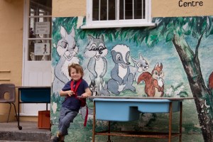 Charlie striking a pose outside of his nursery. 