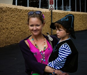 Charlie looking very unhappy at the prospect of walking to Carnival, despite getting the hat.